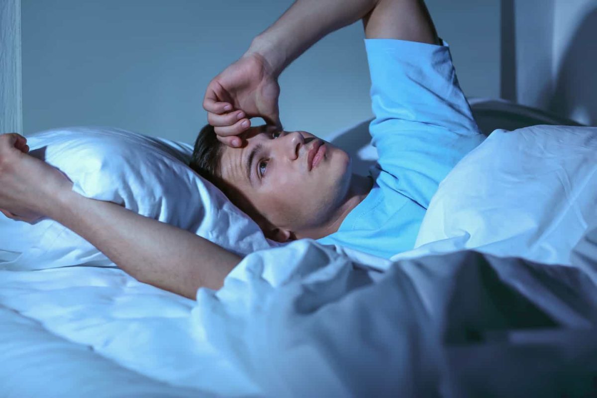 Man suffering from sleep disorder